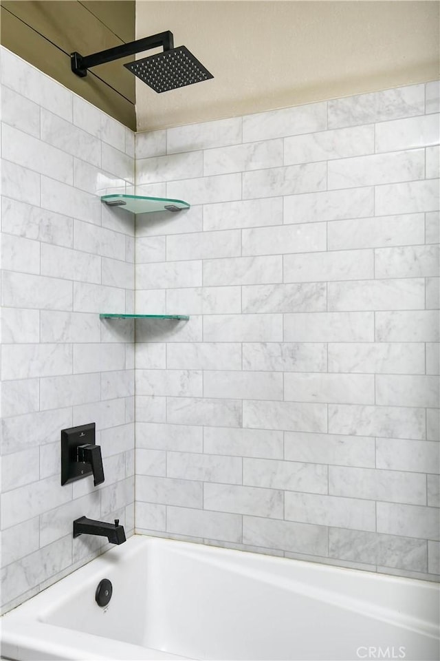 bathroom with shower / bath combination