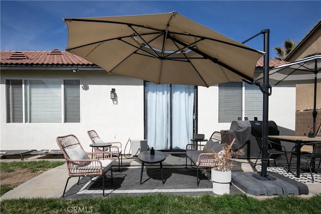 view of patio / terrace featuring outdoor dining area and area for grilling