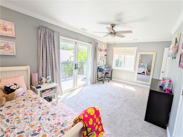 carpeted bedroom featuring ceiling fan, baseboards, access to outside, ornamental molding, and french doors