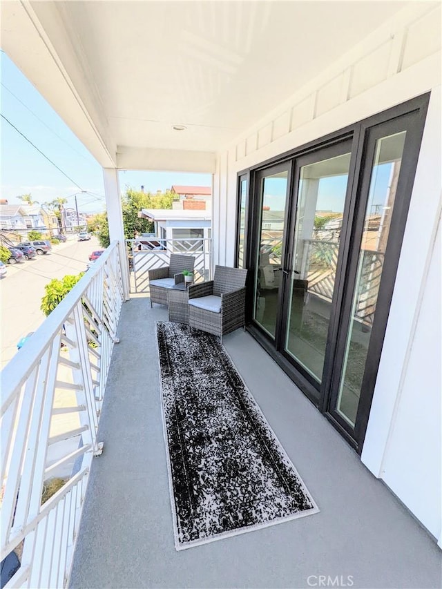 view of patio / terrace with a balcony