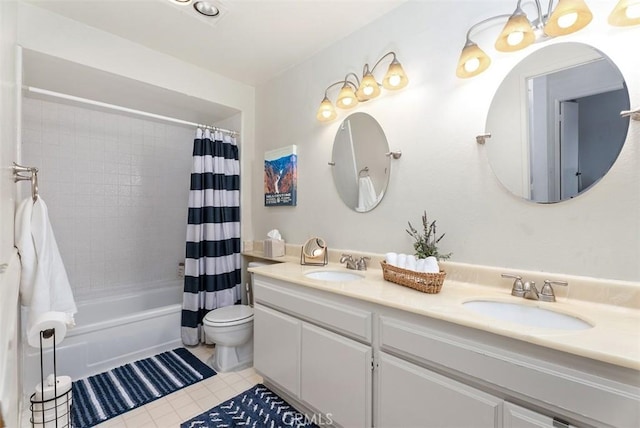 full bath with double vanity, a sink, toilet, and shower / tub combo with curtain