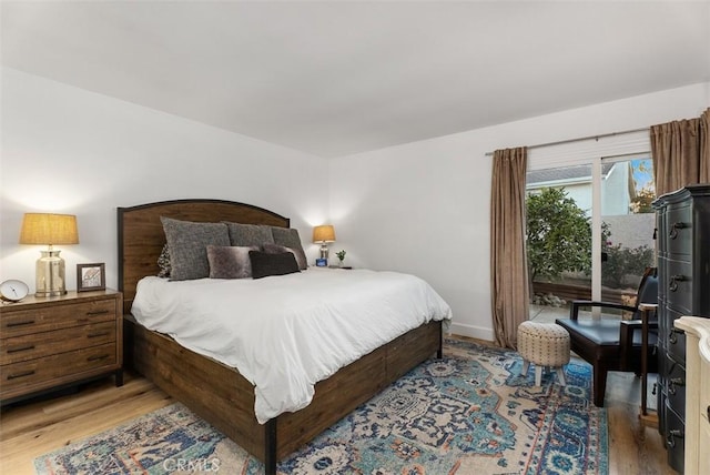 bedroom featuring light wood-type flooring