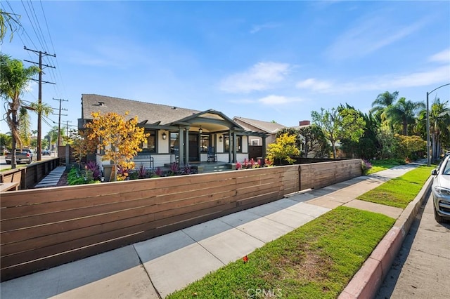 view of front of property with a fenced front yard