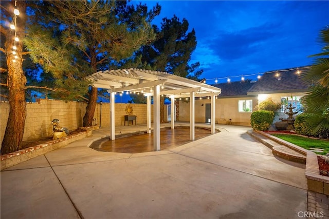 view of patio / terrace with fence and a pergola