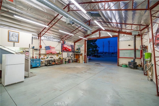 garage featuring freestanding refrigerator