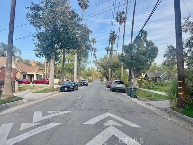 view of street featuring sidewalks and curbs