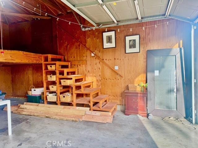 garage with wooden walls