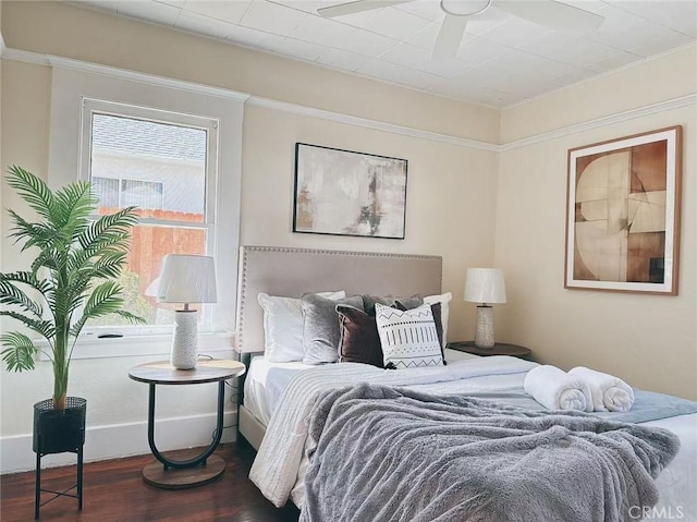 bedroom with wood finished floors