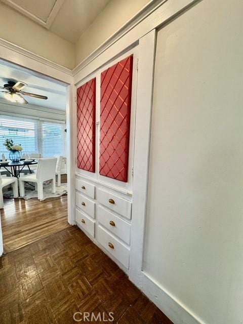 interior space featuring ceiling fan