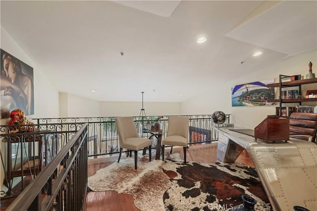 sitting room featuring wood finished floors and recessed lighting