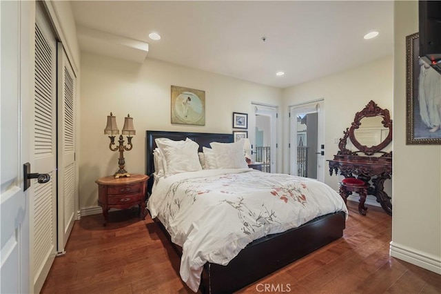 bedroom featuring access to outside, baseboards, dark wood-type flooring, and recessed lighting