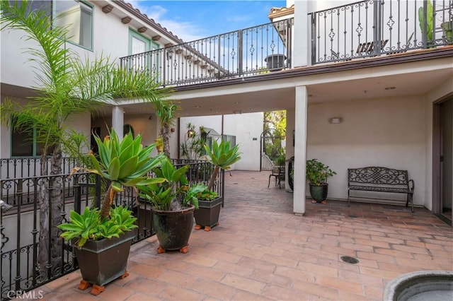 view of patio / terrace featuring a balcony