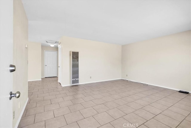 empty room with baseboards