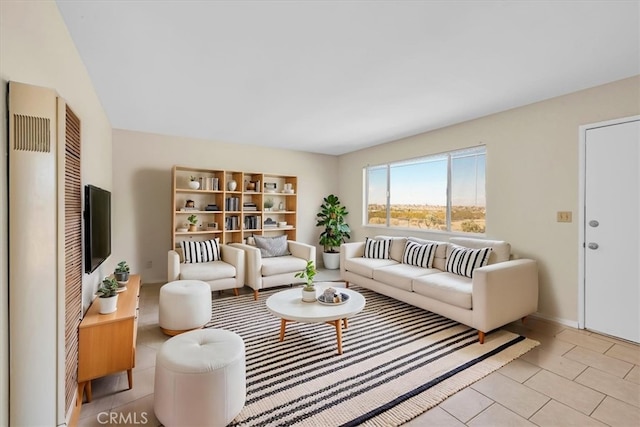 living area featuring light tile patterned flooring