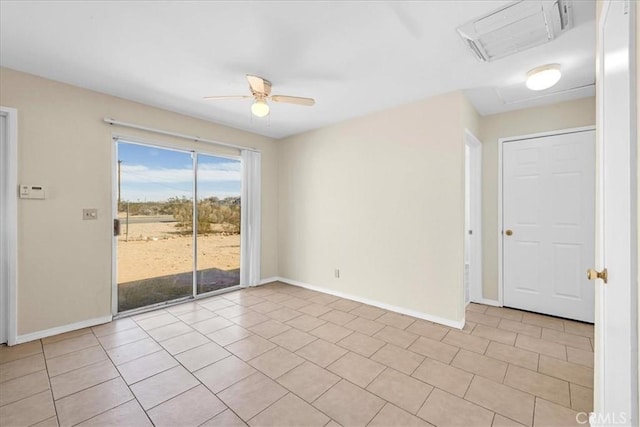 empty room featuring visible vents, baseboards, and ceiling fan