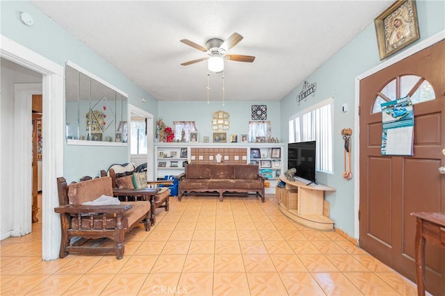 living room featuring ceiling fan