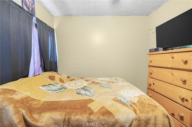 bedroom with a textured ceiling