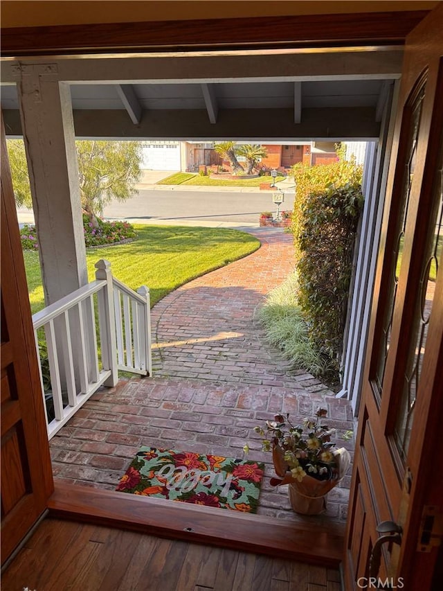 exterior space featuring covered porch