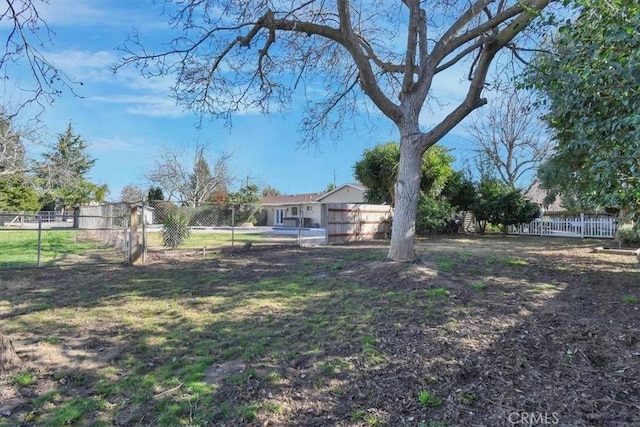 view of yard featuring fence