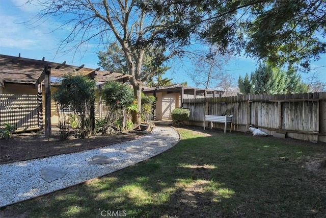 view of yard featuring a fenced backyard