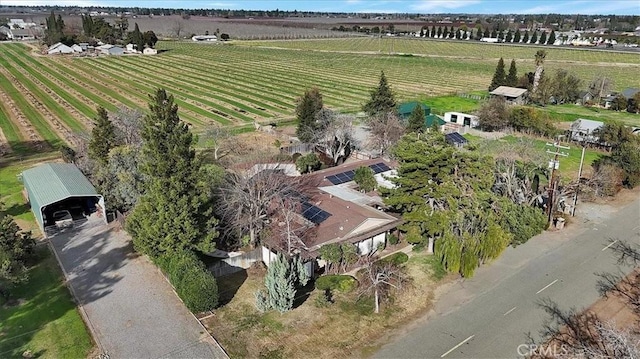 birds eye view of property featuring a rural view