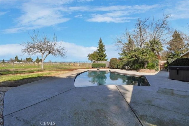 view of swimming pool with fence, a fenced in pool, and a patio