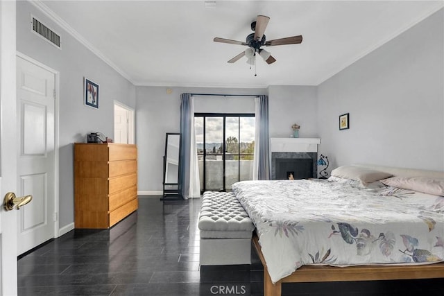 bedroom featuring visible vents, baseboards, access to outside, ornamental molding, and dark wood finished floors