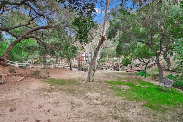 view of yard featuring fence