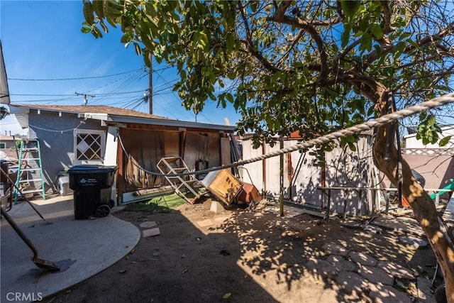 exterior space with a fenced backyard