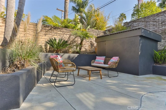 view of patio with fence