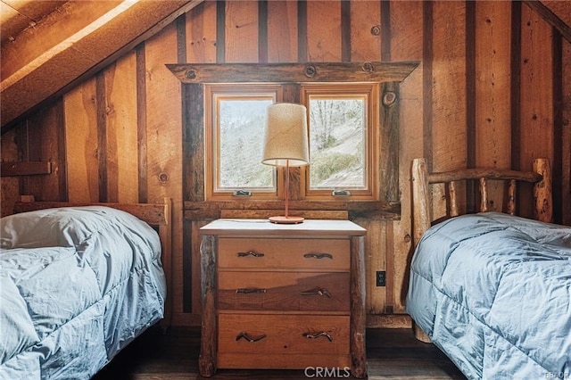 bedroom with lofted ceiling