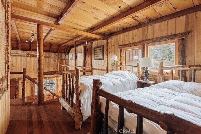 bedroom featuring beamed ceiling, dark wood-type flooring, wood walls, and wood ceiling