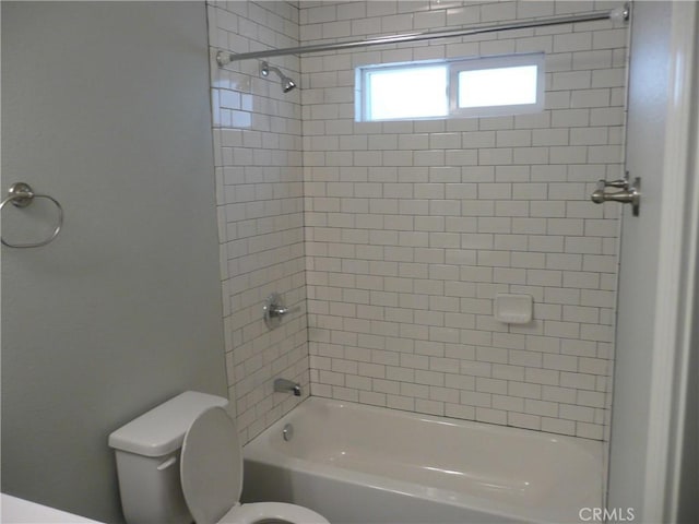 full bathroom featuring bathtub / shower combination and toilet