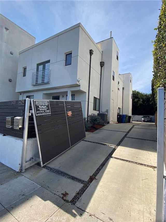 view of property exterior with stucco siding