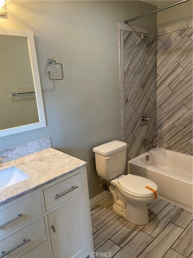 full bathroom with toilet, wood tiled floor, shower / washtub combination, and vanity