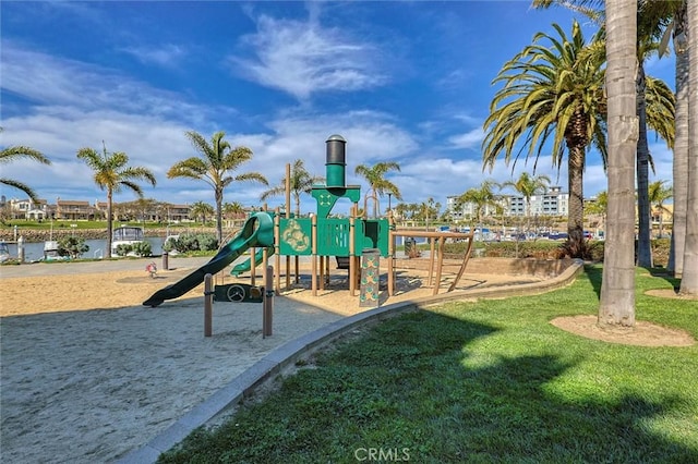 community jungle gym with a yard