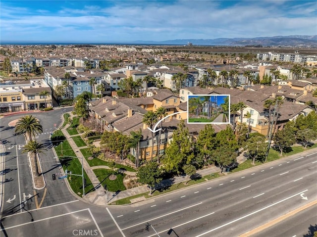 bird's eye view with a mountain view and a residential view