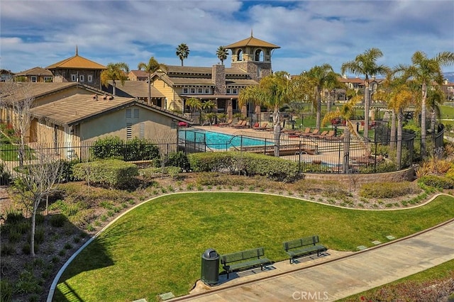 exterior space featuring fence and a yard