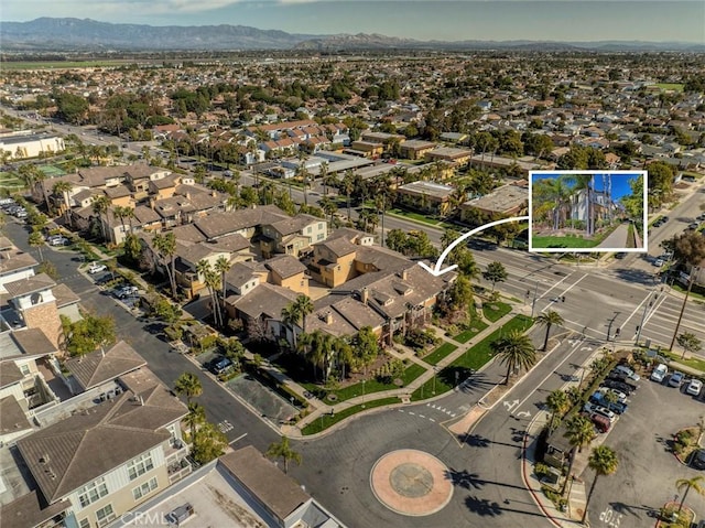 aerial view with a residential view and a mountain view