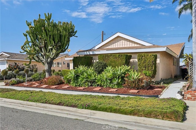 view of front of property featuring stucco siding