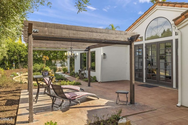 view of patio with a pergola and french doors