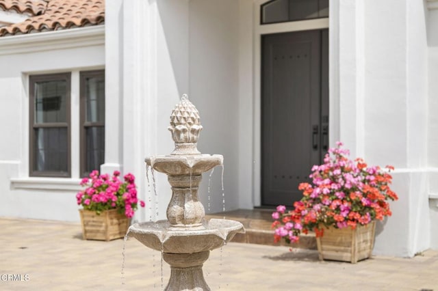 entrance to property with a tiled roof