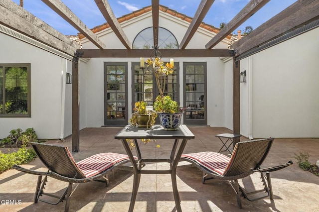 view of patio featuring a pergola