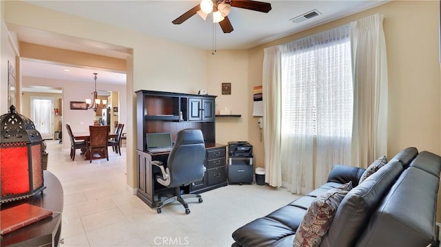 office area with ceiling fan with notable chandelier and visible vents