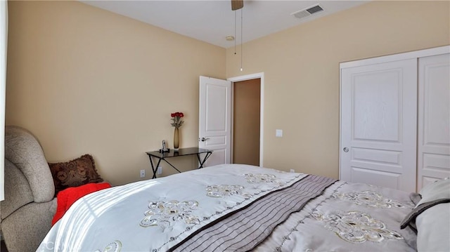 bedroom featuring ceiling fan and visible vents