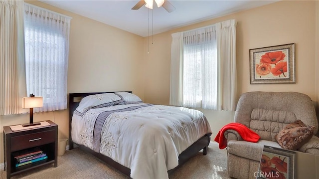 bedroom featuring carpet flooring and a ceiling fan