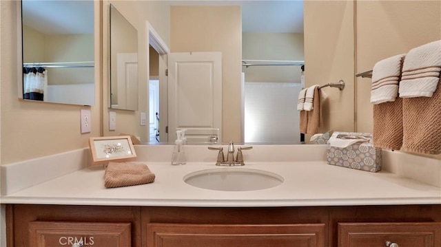 full bathroom with vanity