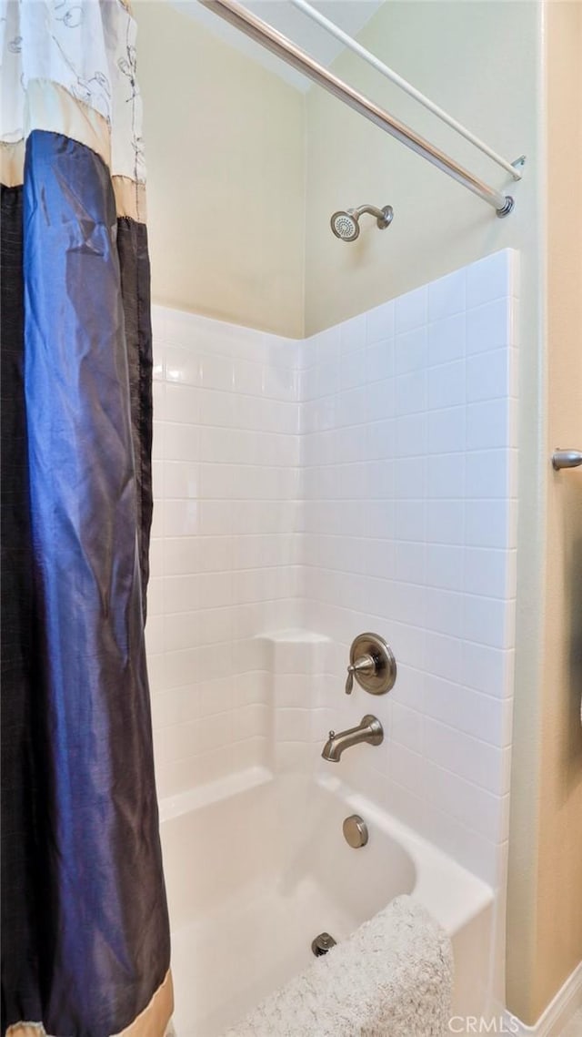 full bathroom with shower / bath combination with curtain