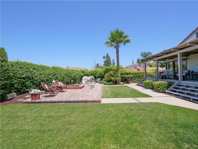 view of yard with a patio area