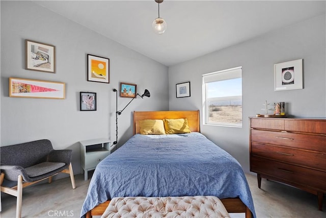 bedroom with lofted ceiling